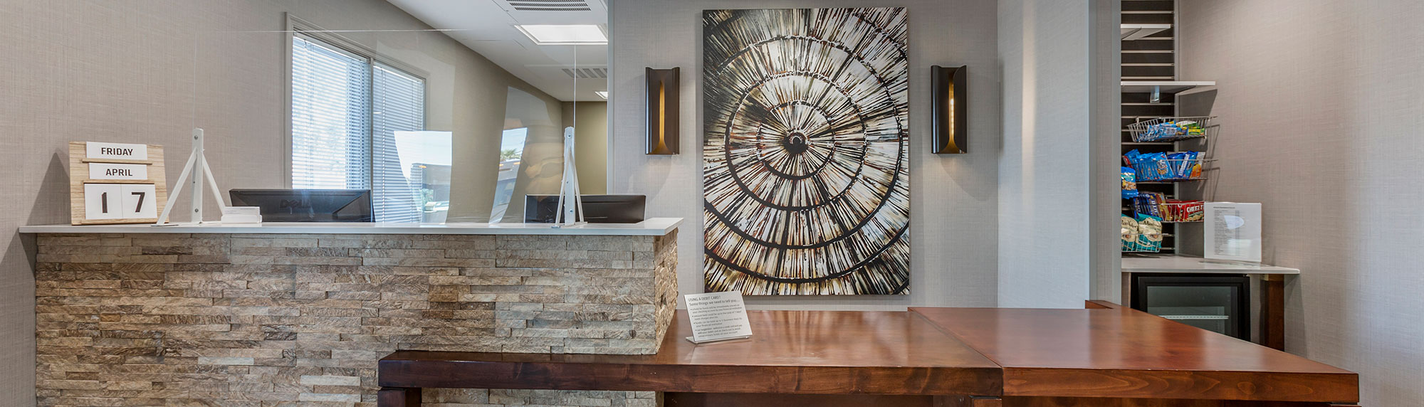 Lobby and front desk of Windmill Suites